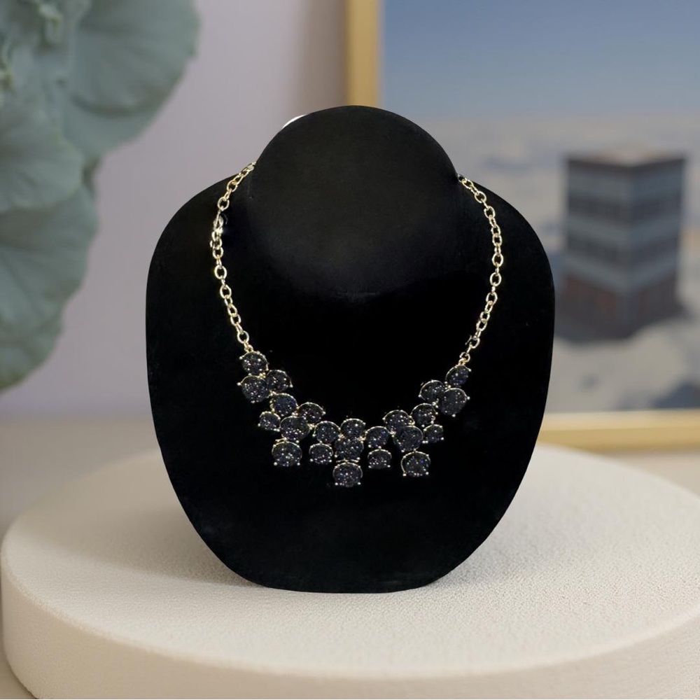 Elegant Gold and Black Necklace with Intricate Design